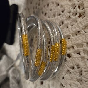 6 jelly silver tone and gold bracelets
